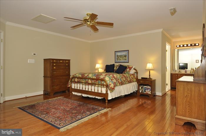 115 Fox Trail Terrace Gaithersburg, MD 20878 - Photo 7 of 22 a bedroom with a bed and dresser
