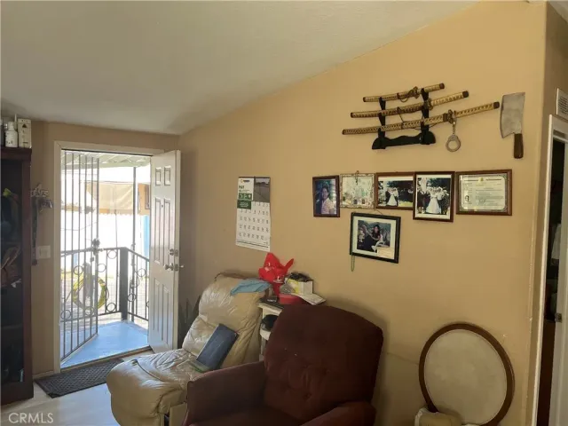 a living room with furniture and walls