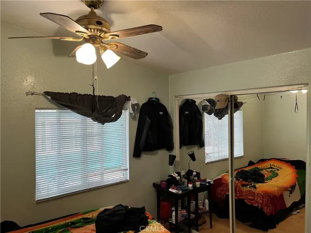 a view of a hallway with a dining area