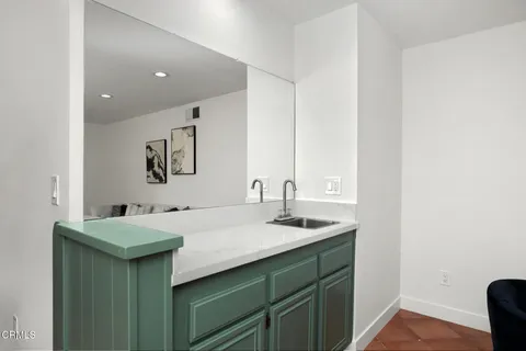 a view of a hallway with an entryway