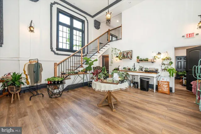 a kitchen with stainless steel appliances kitchen island granite countertop a sink and cabinets