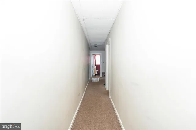 a kitchen with sink cabinets and window