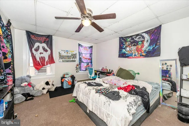 a kitchen with stainless steel appliances granite countertop a refrigerator stove and sink