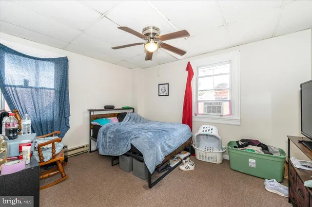 a bathroom with a sink a toilet and a bathtub