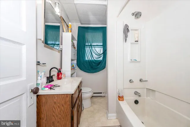 a view of a hallway with staircase