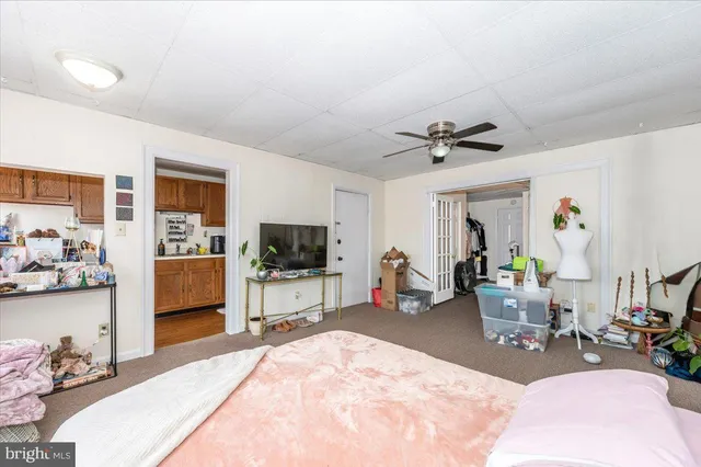 a view of a hallway with a white walls