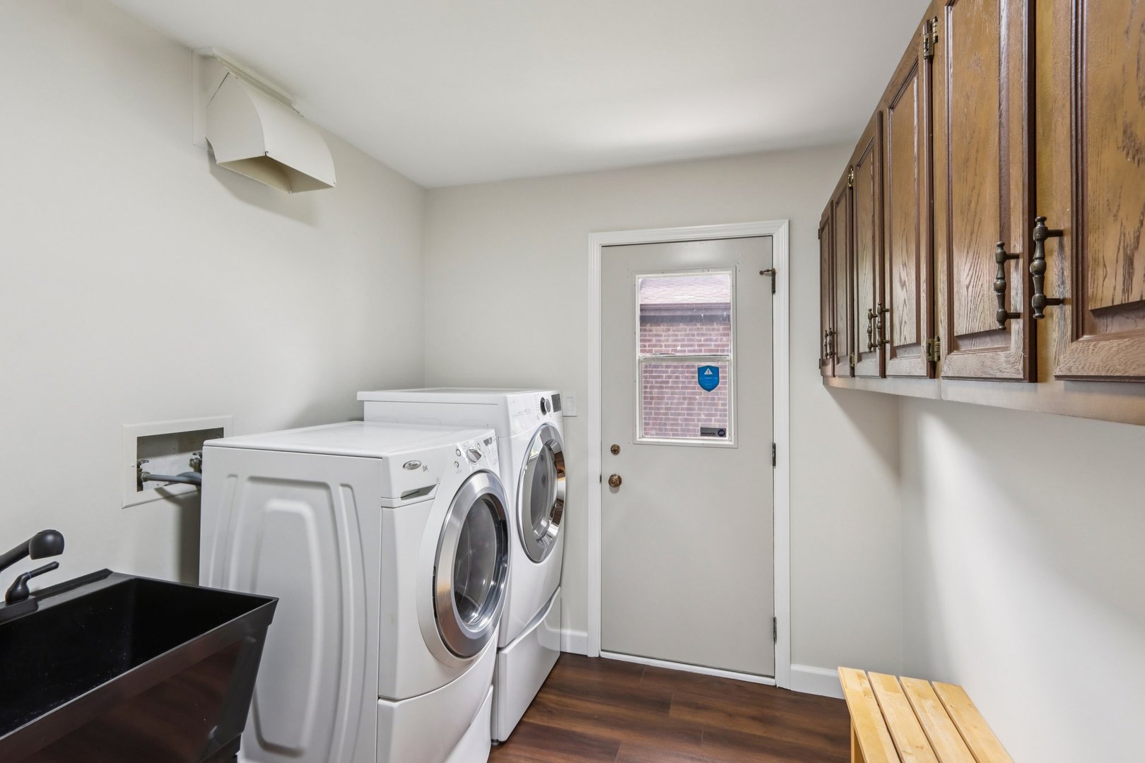 6527 Maple Street Morton Grove, IL 60053 - Photo 14 of 35 a utility room with dryer and washer