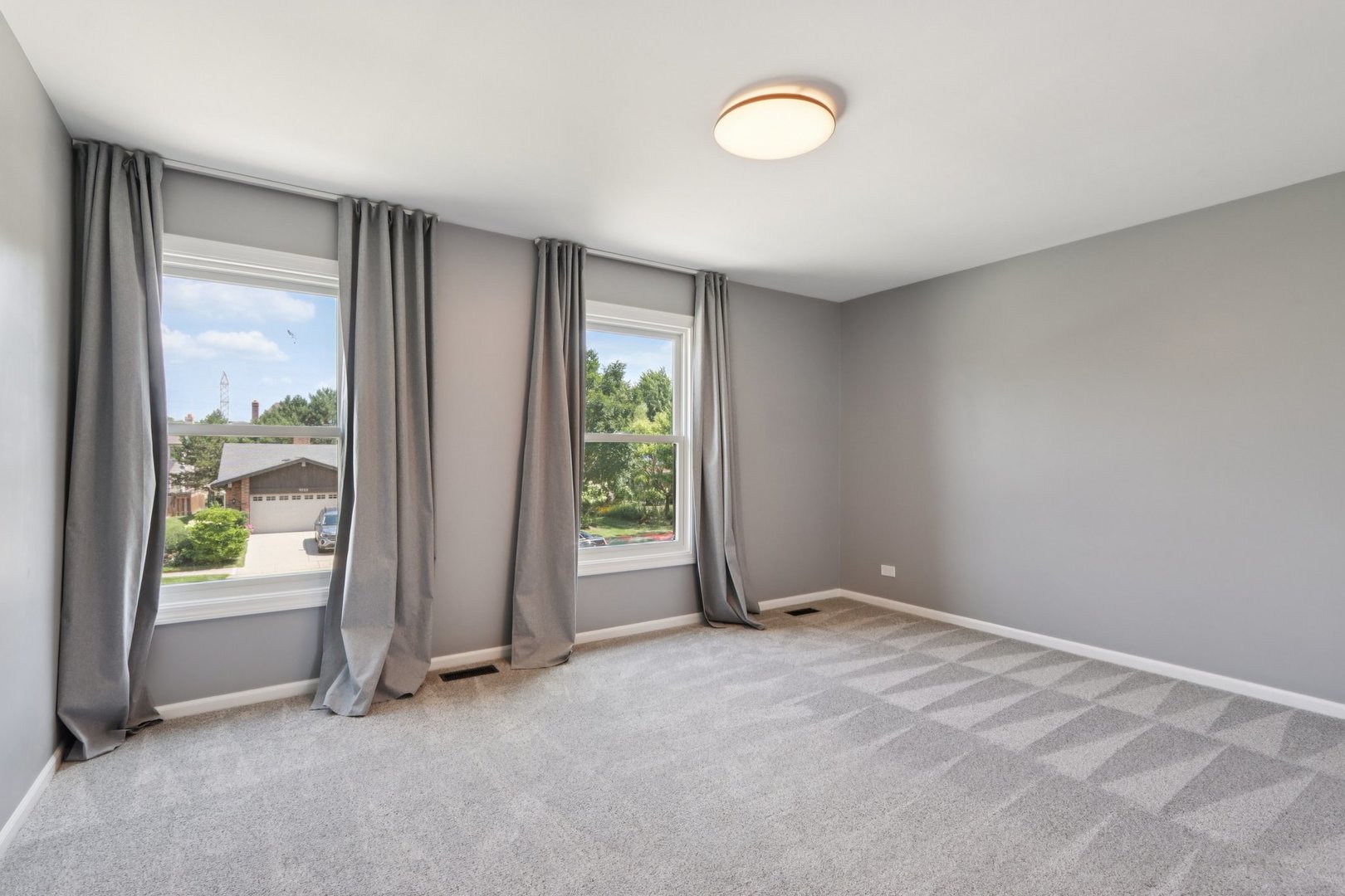 6527 Maple Street Morton Grove, IL 60053 - Photo 21 of 35 an empty room with windows