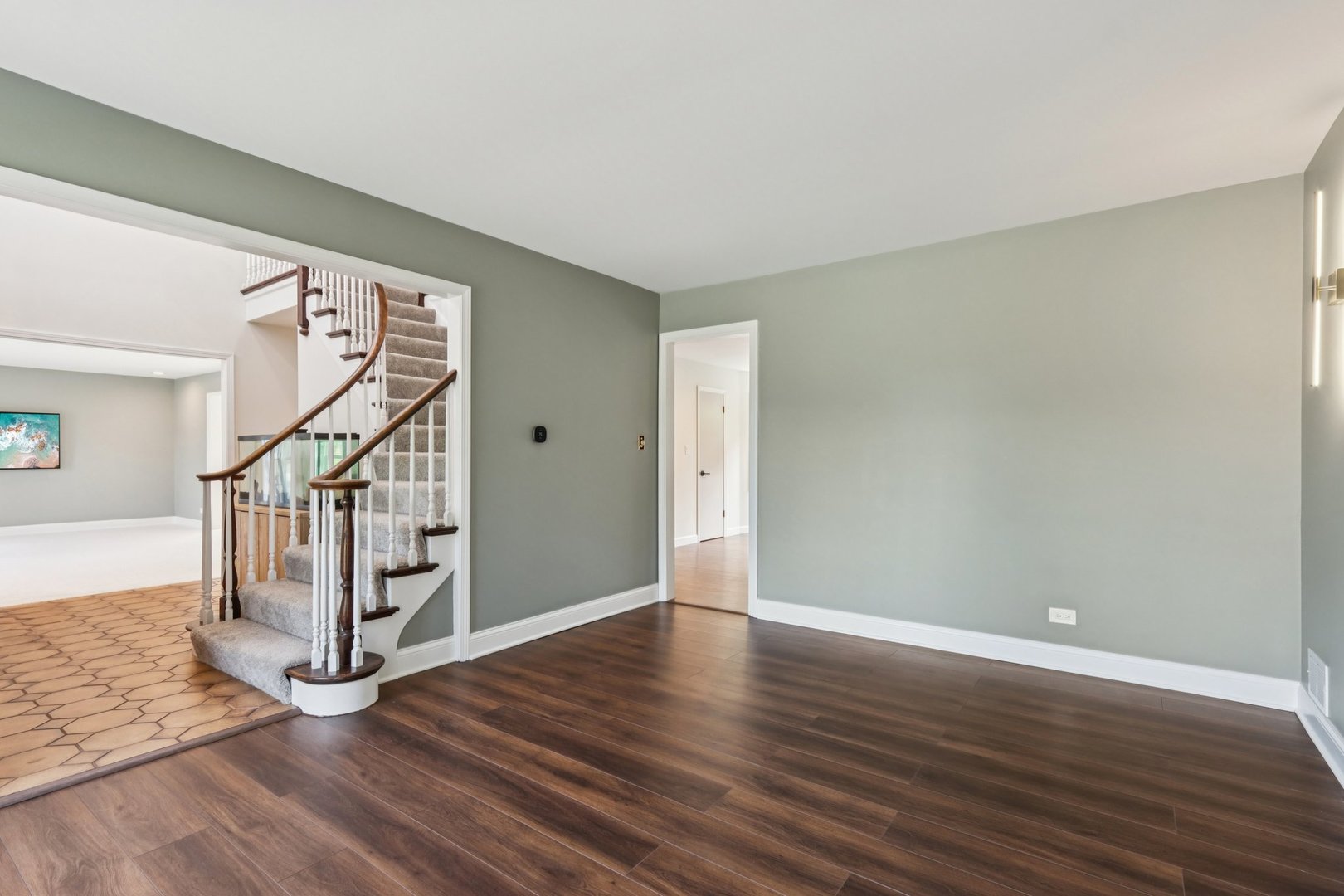 6527 Maple Street Morton Grove, IL 60053 - Photo 7 of 35 a view of entryway with wooden floor