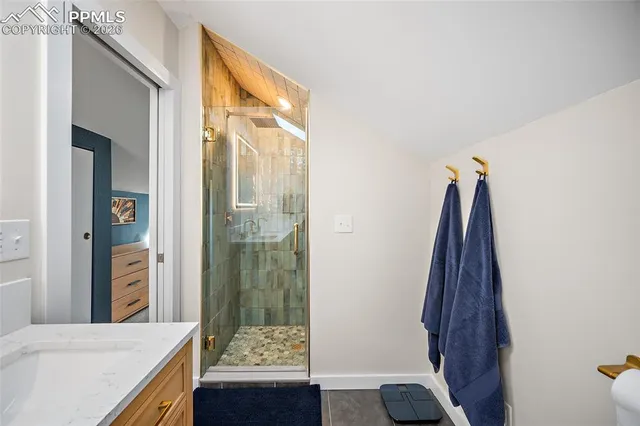 a view of a bedroom and a bathroom