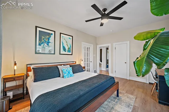 a view of house with backyard and sitting area