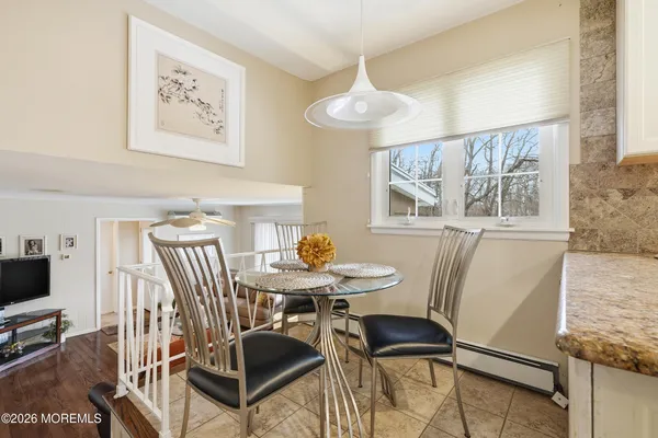 a kitchen with stainless steel appliances granite countertop a sink and a stove