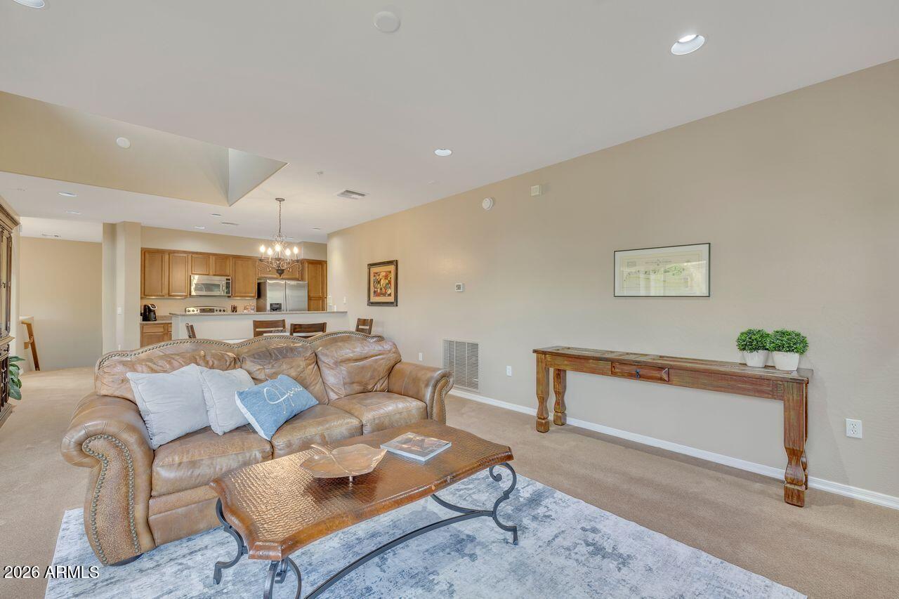 3935 East Rough Rider Road, Unit 1106 Phoenix, AZ 85050 - Photo 16 of 45 Large space with natural light