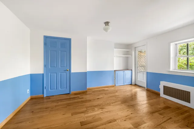 a spacious bathroom with a bathtub and a sink