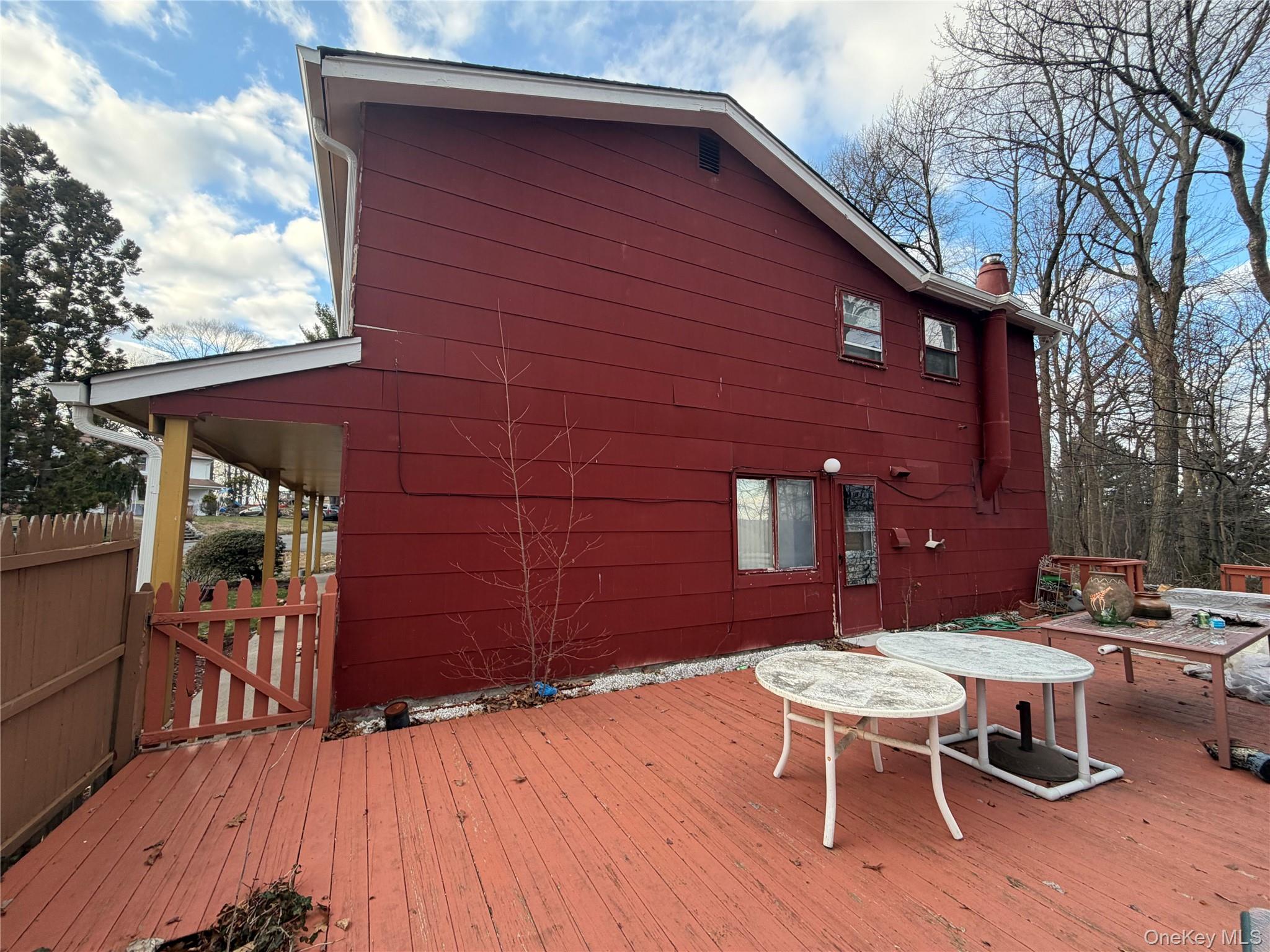 15 Bonnie Court Spring Valley, NY 10977 - Photo 18 of 22 a backyard of a house with table and chairs