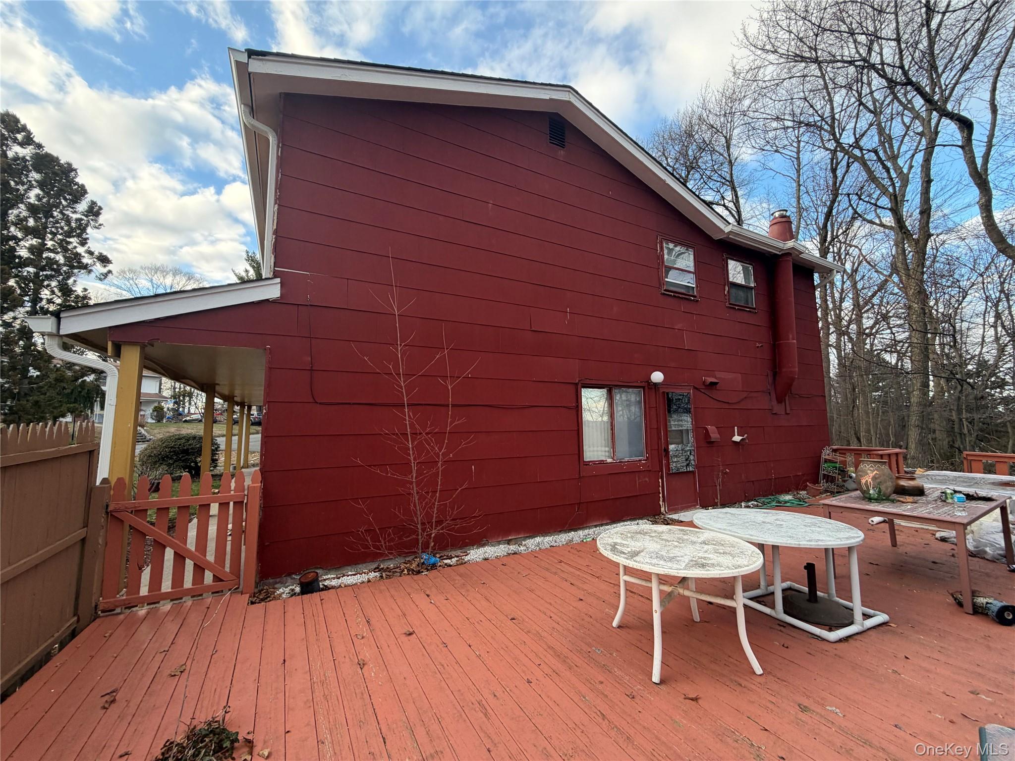 15 Bonnie Court Spring Valley, NY 10977 - Photo 19 of 22 a backyard of a house with table and chairs