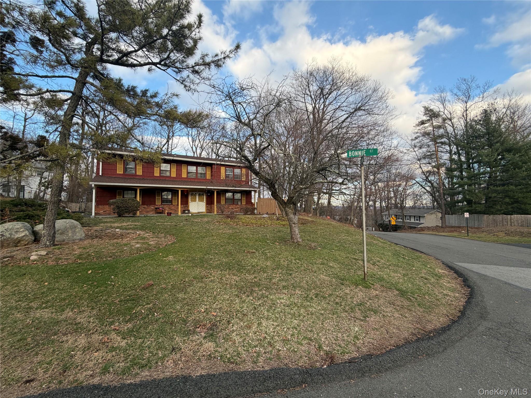 15 Bonnie Court Spring Valley, NY 10977 - Photo 3 of 22 a front view of house with trees