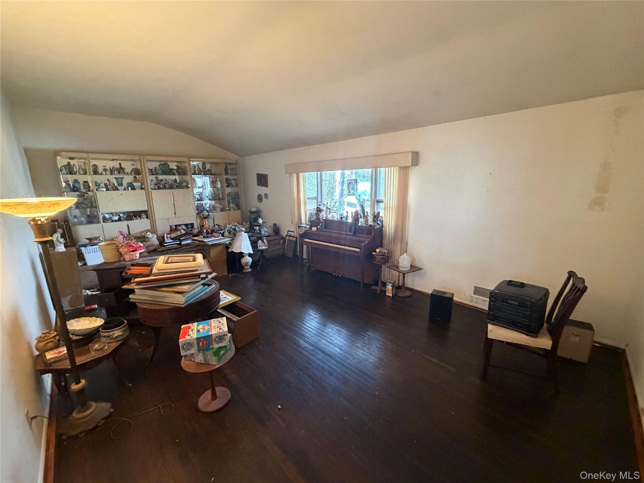 15 Bonnie Court Spring Valley, NY 10977 - Photo 5 of 22 a living room with furniture and a wooden floor