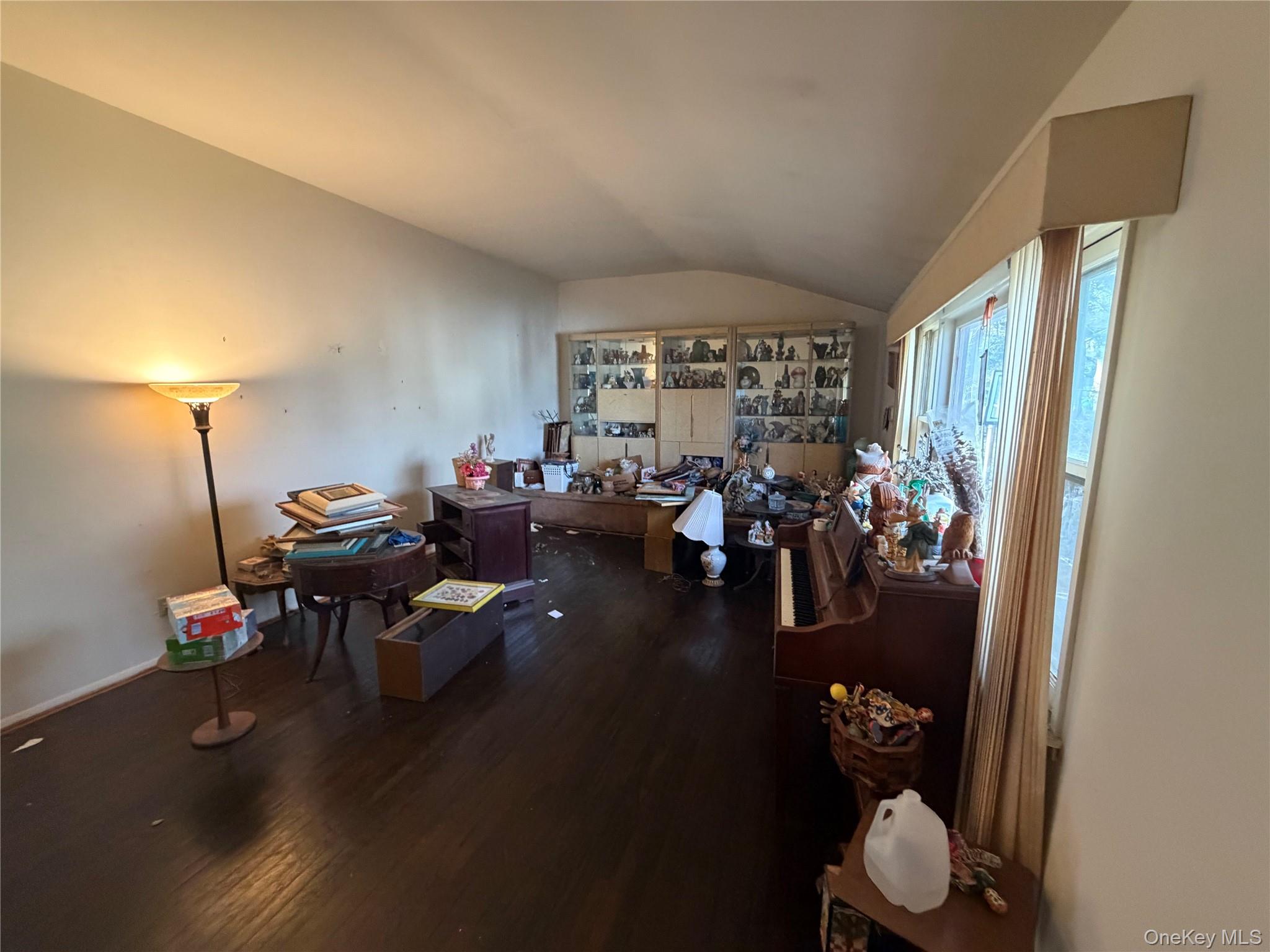 15 Bonnie Court Spring Valley, NY 10977 - Photo 6 of 22 a living room with furniture and a wooden floor