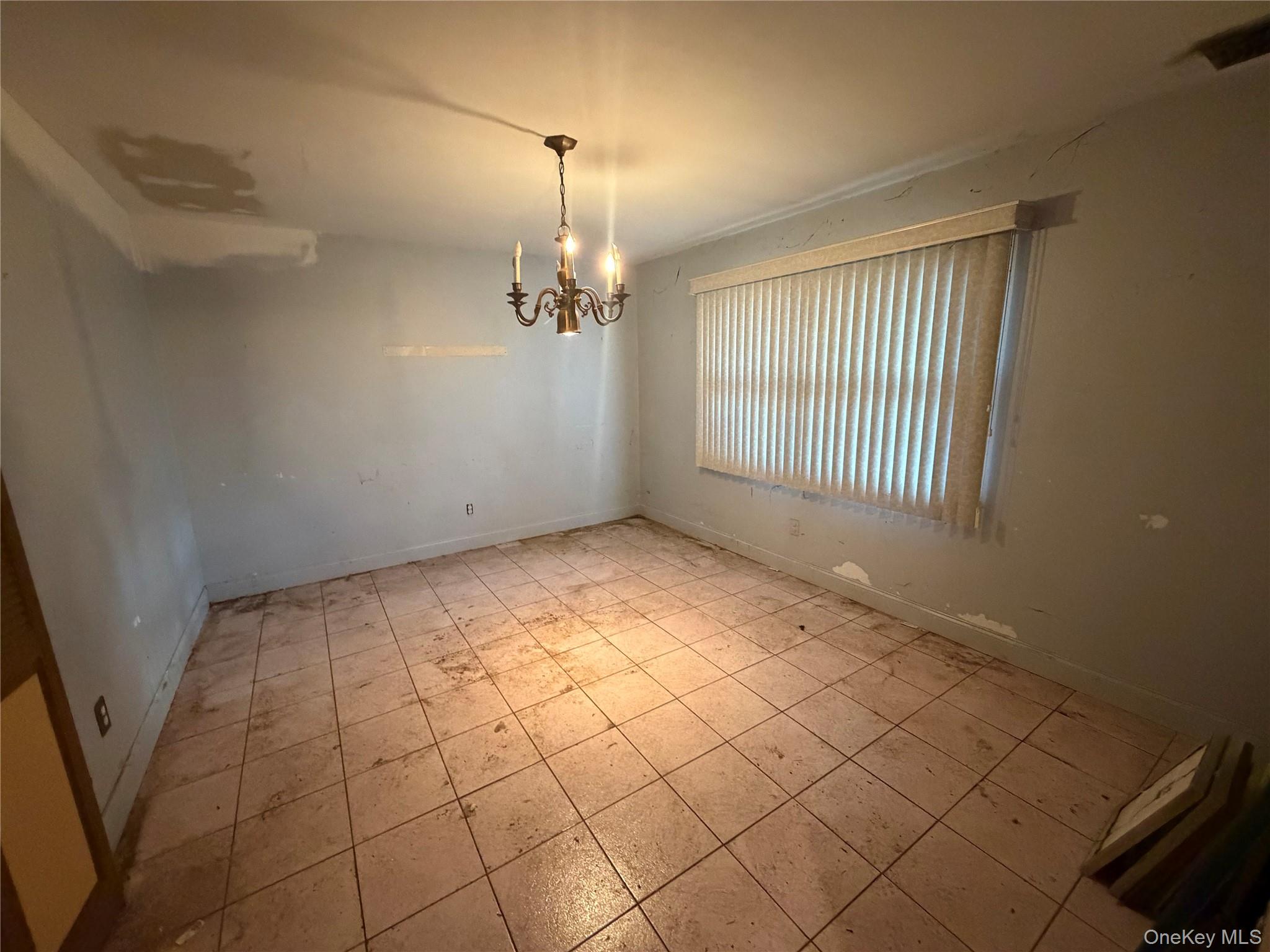 15 Bonnie Court Spring Valley, NY 10977 - Photo 8 of 22 a view of an empty room and a window