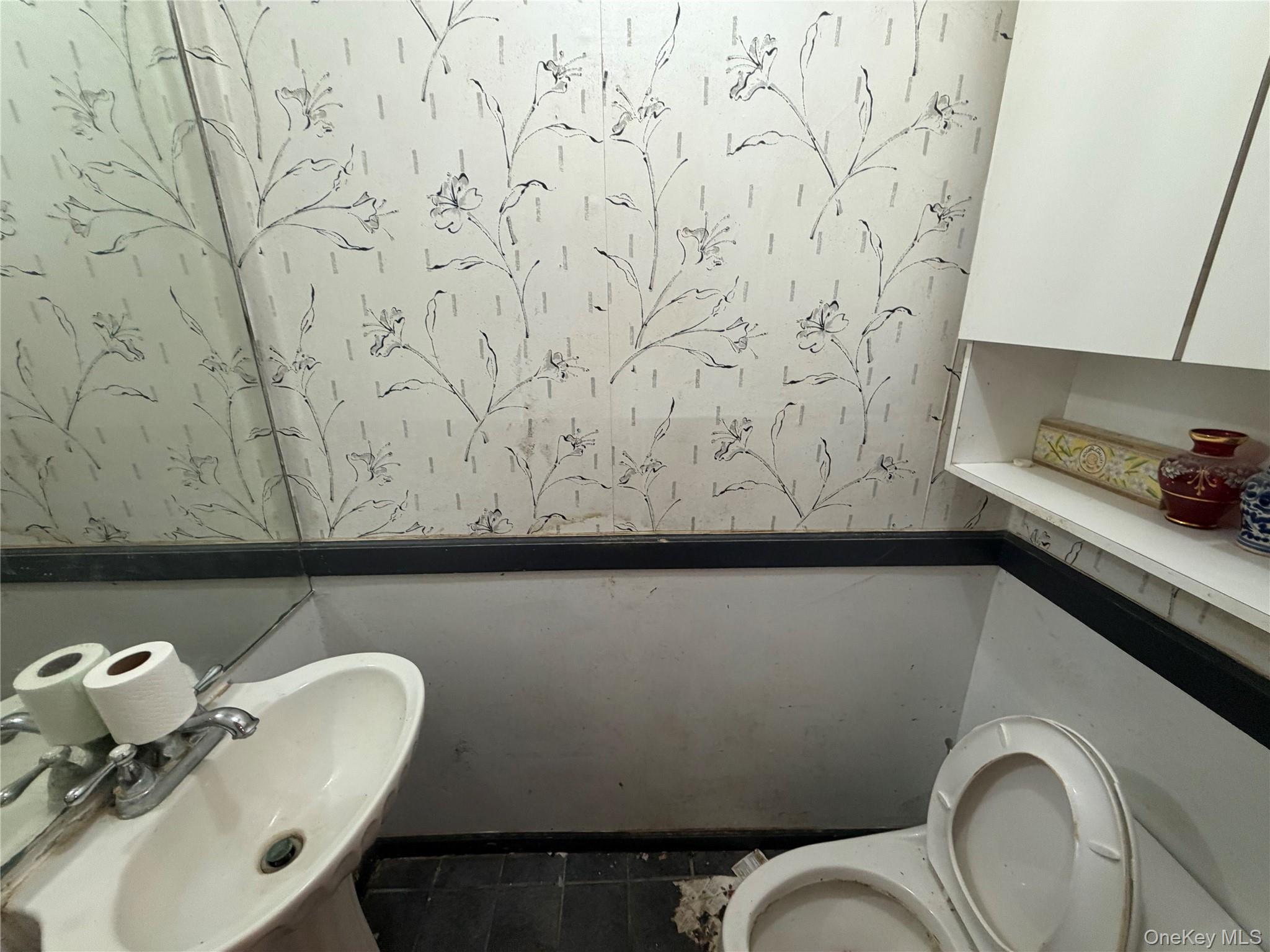 15 Bonnie Court Spring Valley, NY 10977 - Photo 10 of 22 a view of bathroom with a sink and mirror