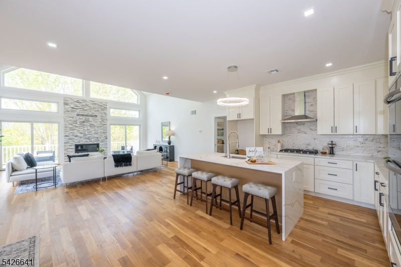 124 Wheatsworth Road Hamburg, NJ 07419 - Photo 13 of 50 a large kitchen with cabinets table and chairs