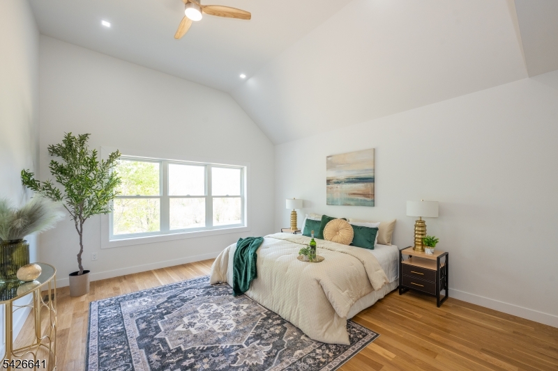 124 Wheatsworth Road Hamburg, NJ 07419 - Photo 23 of 50 a bedroom with a bed and a window