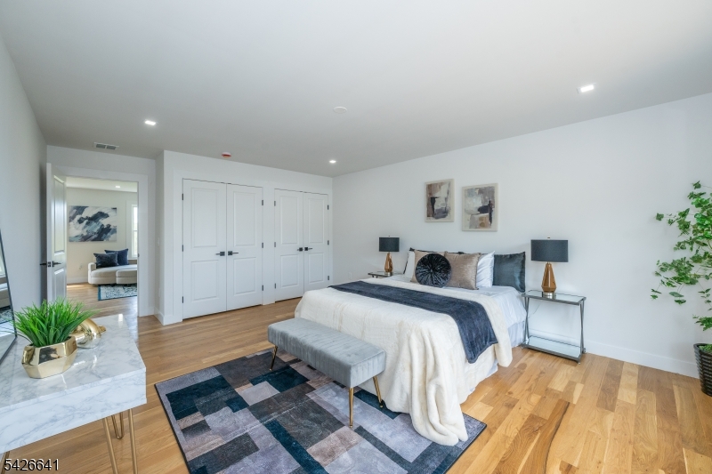 124 Wheatsworth Road Hamburg, NJ 07419 - Photo 44 of 50 a spacious bedroom with a bed and a couch