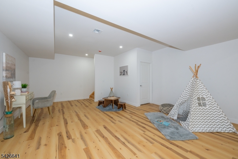 124 Wheatsworth Road Hamburg, NJ 07419 - Photo 45 of 50 a bed room with a bed