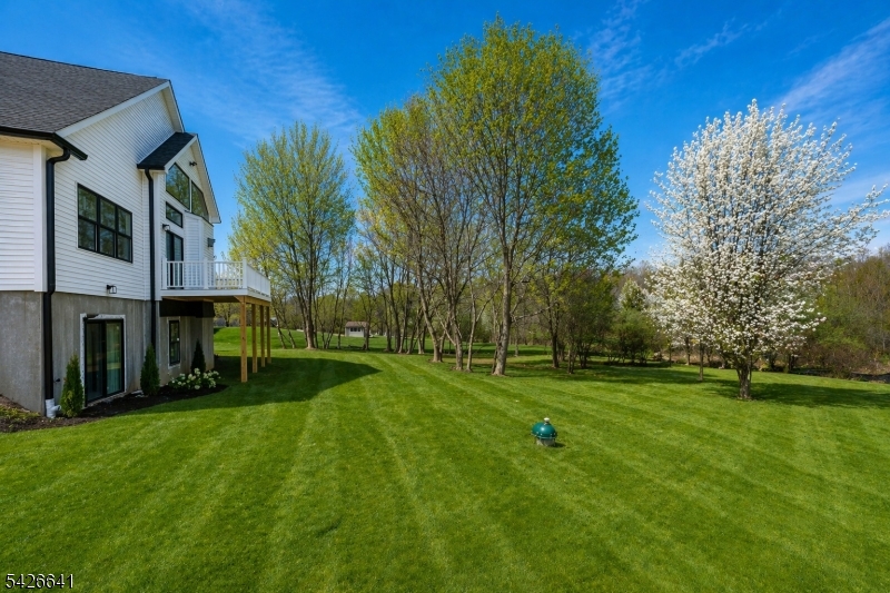 124 Wheatsworth Road Hamburg, NJ 07419 - Photo 5 of 50 a view of a park with a house in the background