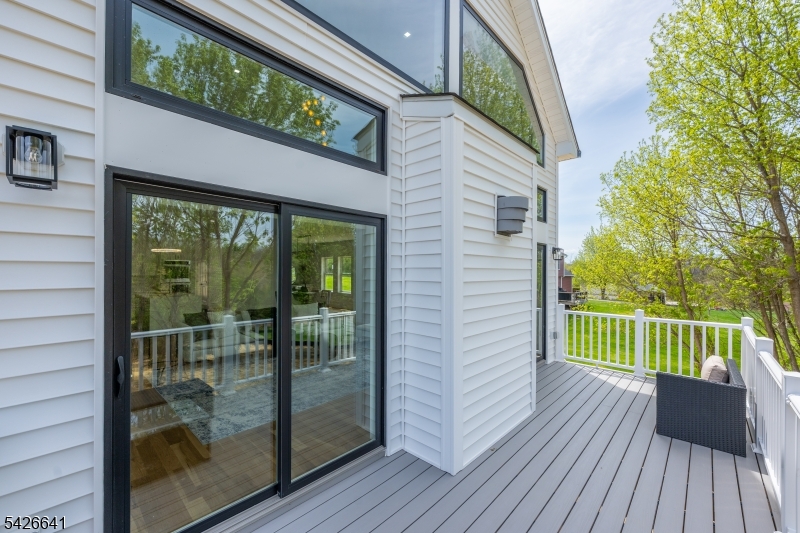 124 Wheatsworth Road Hamburg, NJ 07419 - Photo 7 of 50 a view of a house with a wooden deck