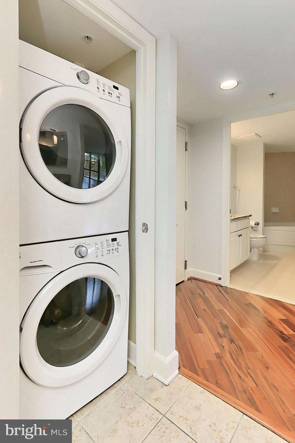 11800 Sunset Hills Road, Unit 513 Reston, VA 20190 - Photo 15 of 43 Full size stacked washer and dryer.