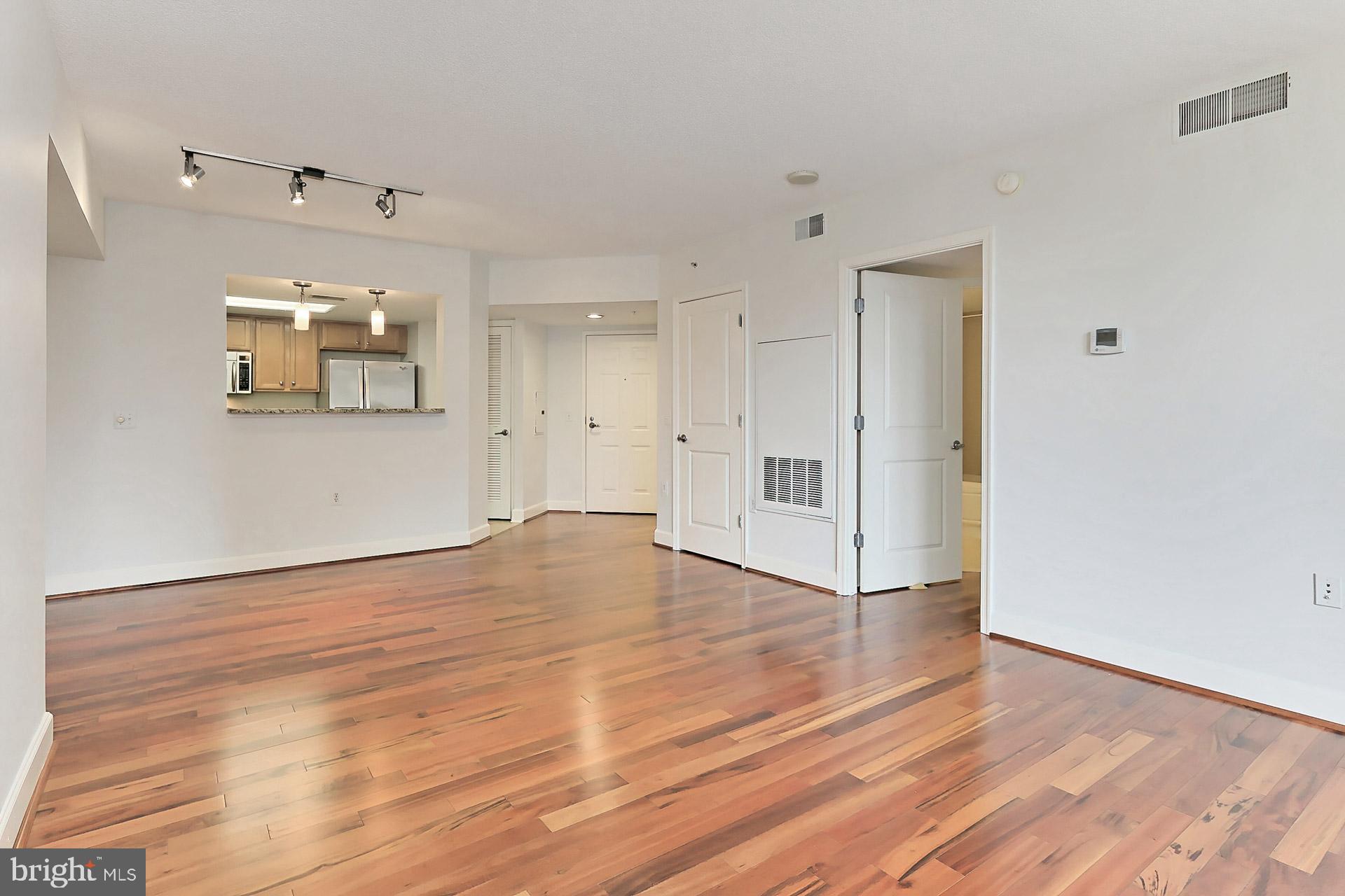 11800 Sunset Hills Road, Unit 513 Reston, VA 20190 - Photo 18 of 43 Living and dining combination