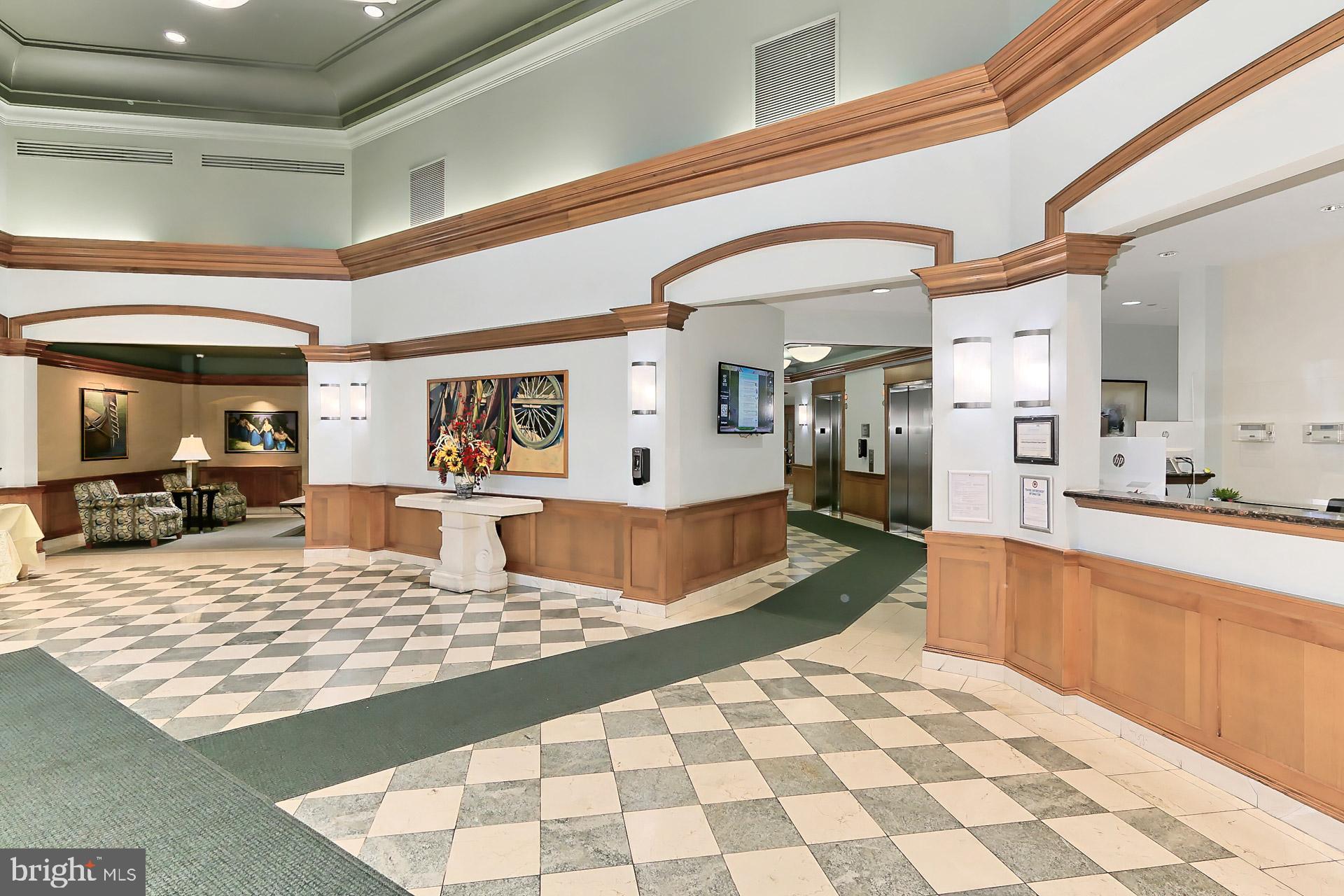 11800 Sunset Hills Road, Unit 513 Reston, VA 20190 - Photo 5 of 43 Welcoming lobby with Concierge service.