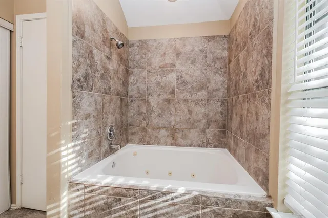 a bathroom with a bathtub