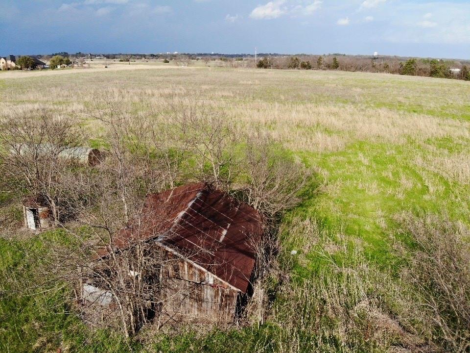 1900 Nesuda Road Ennis, TX 75119 - Photo 8 of 17 a view of an ocean and beach