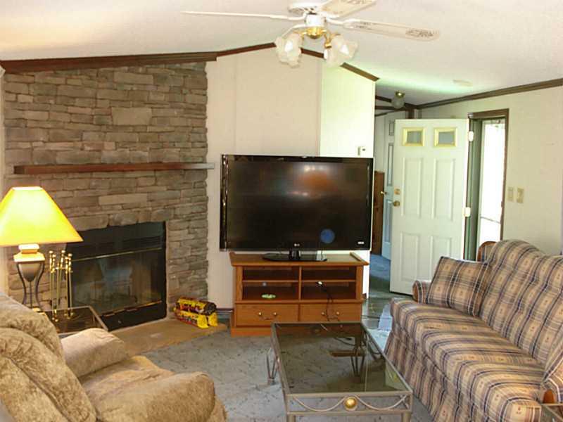 213 Maple Lane Perryopolis, PA 15473 - Photo 2 of 11 Living Room. Living Room With wood burning Fireplace