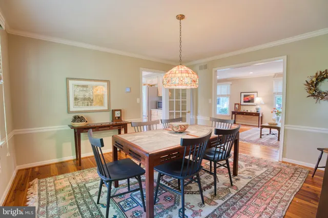 a kitchen with a white stove top oven and sink