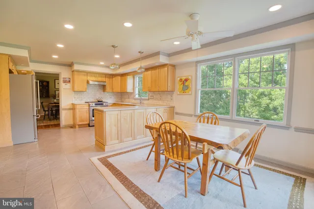 a bedroom with furniture and a fireplace