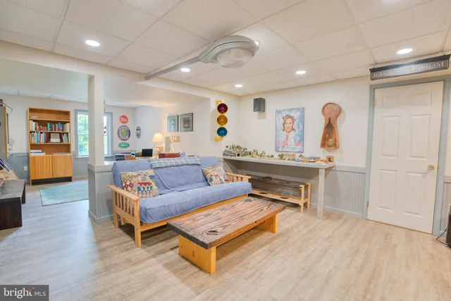 a view of a house with a yard and plants