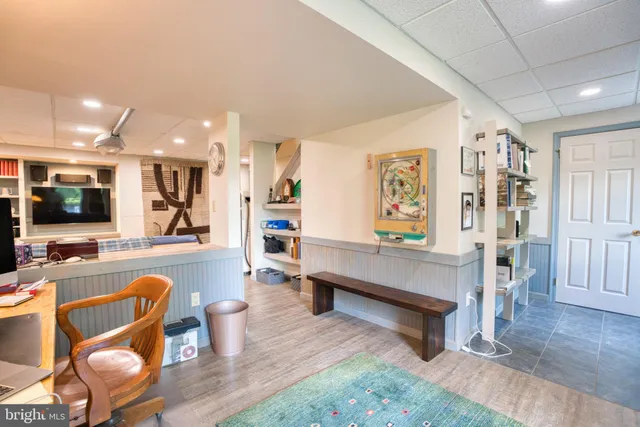 a view of a garden with a building in the background