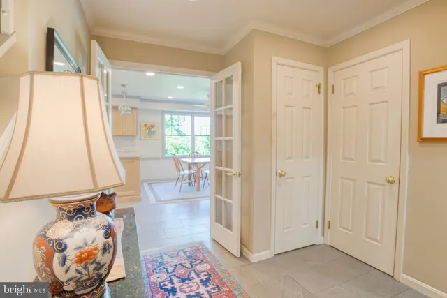 a view of room with furniture and wooden floor