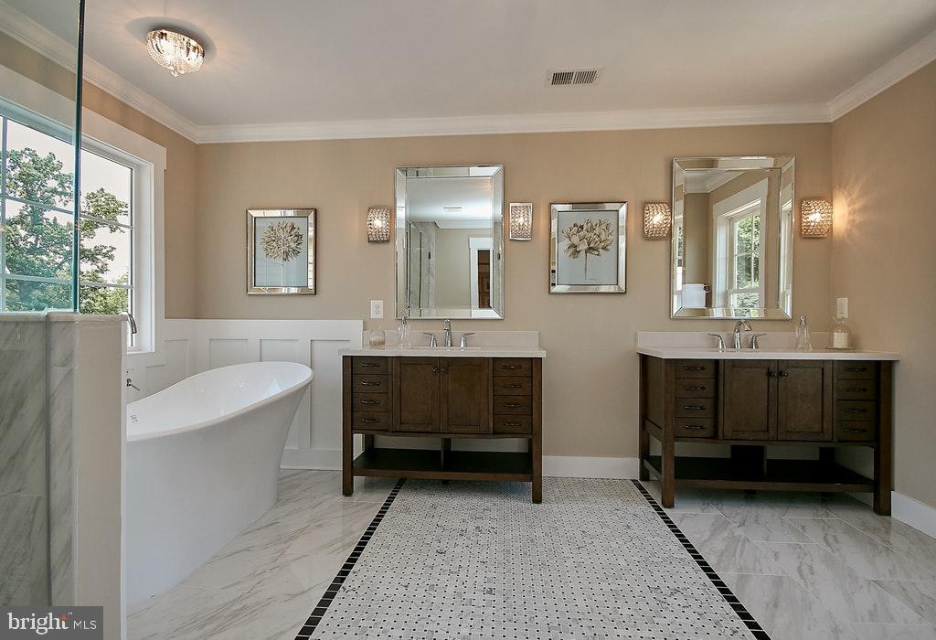 3117 Spring Drive Alexandria, VA 22306 - Photo 22 of 48 Elegant bath, split sinks, custom tile work