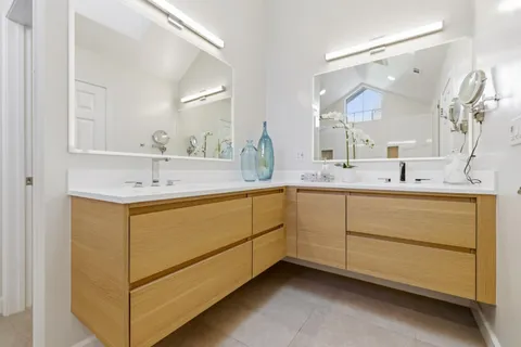 a bathroom with a bathtub and a sink