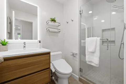 a view of a backyard with sitting area