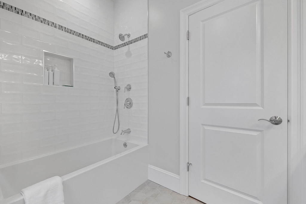 4 Coyne Road, Unit 4 Newton, MA 02468 - Photo 14 of 18 a bathroom with a bathtub