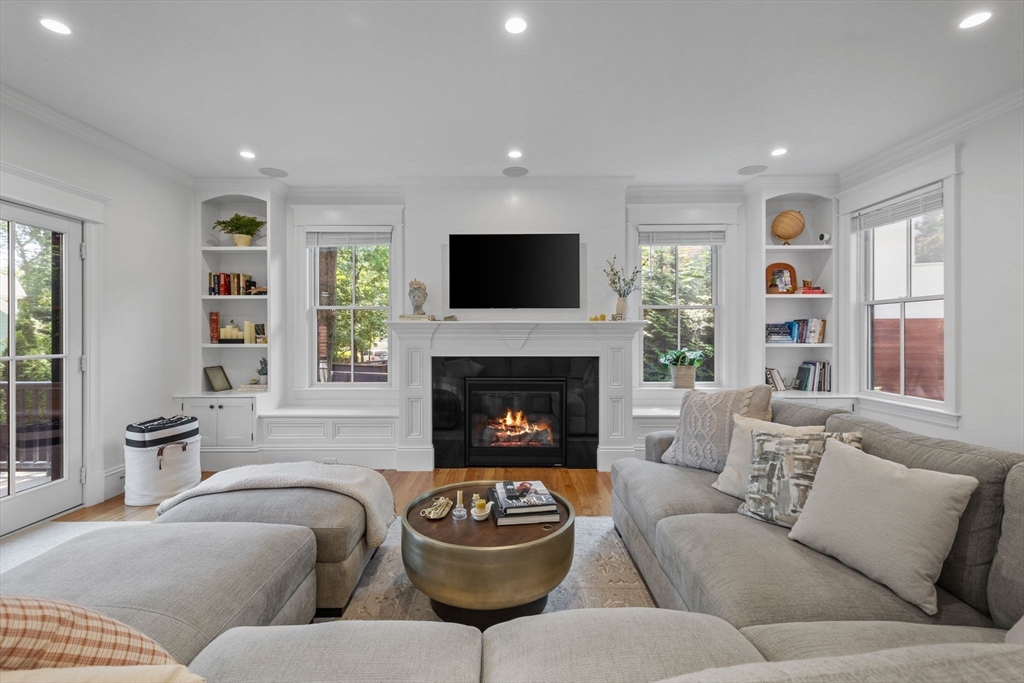 4 Coyne Road, Unit 4 Newton, MA 02468 - Photo 4 of 18 a living room with furniture and a fireplace
