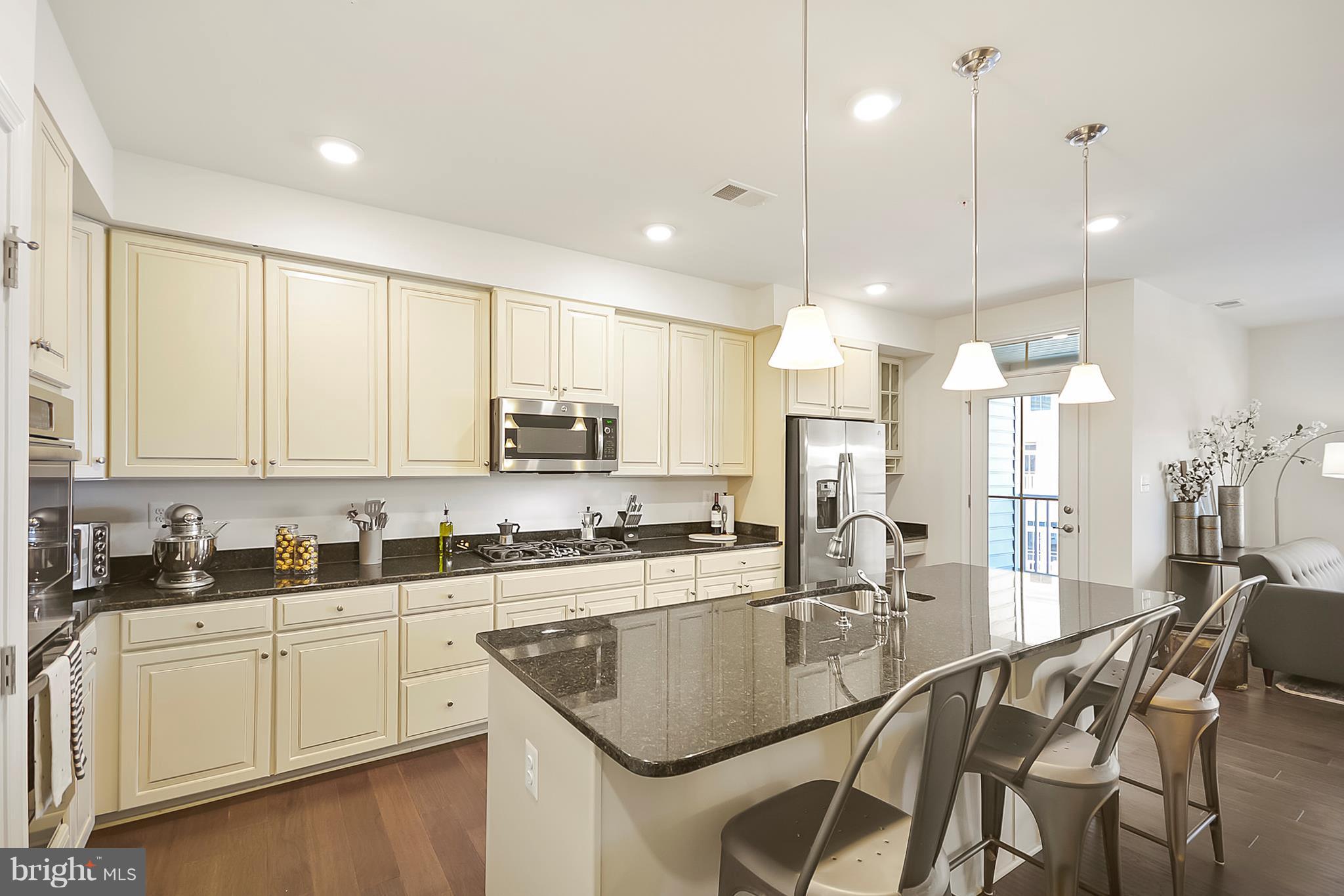5946 Leben Drive Frederick, MD 21703 - Photo 5 of 23 Upgraded cabinetry w/ granite and ss appliances