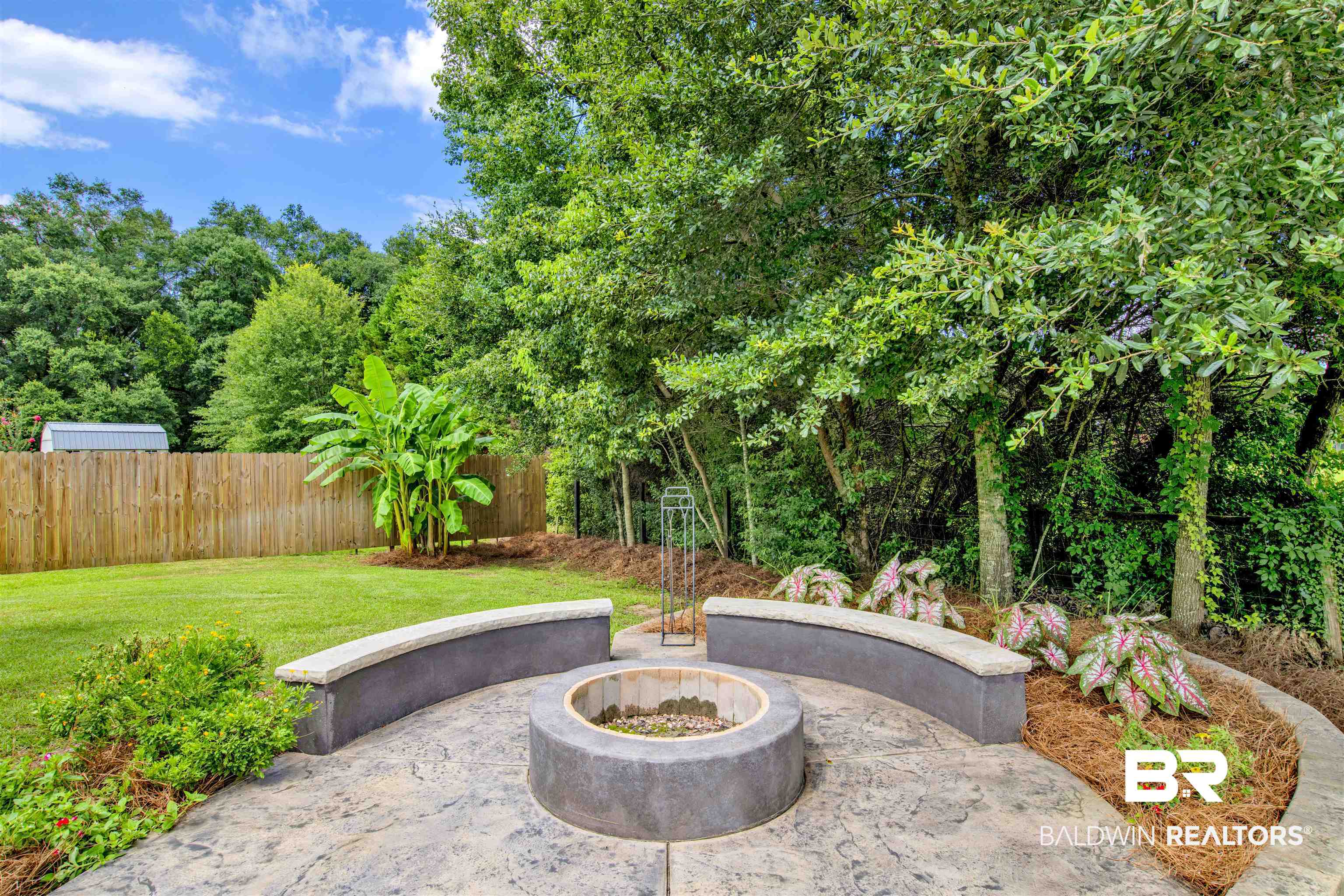 21282 Merlot Loop Silverhill, AL 36576 - Photo 6 of 27 View of patio / terrace with a fire pit