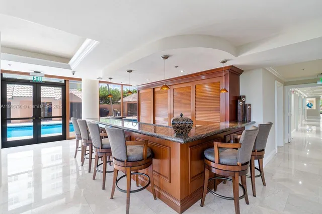 a view of a swimming pool with a lounge chairs